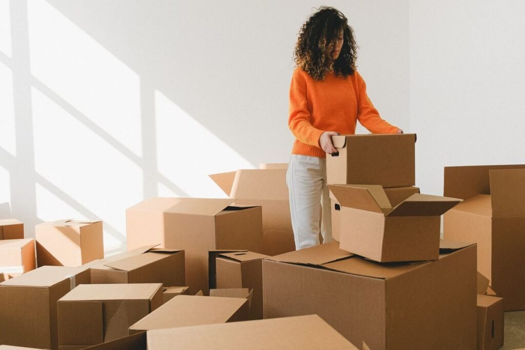 Tenant packing moving boxes before ending a rental contract in the Netherlands